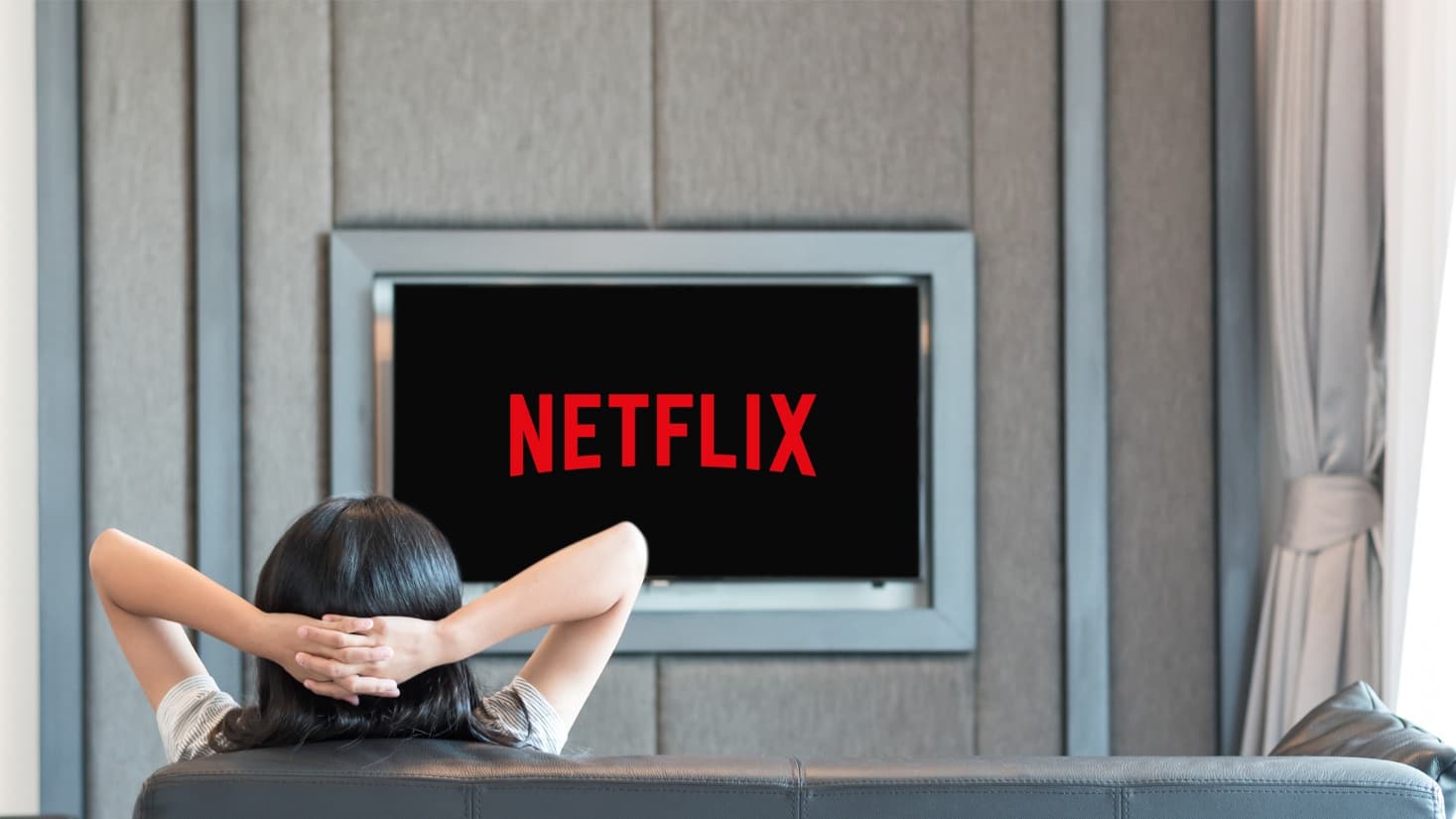 Guest watching Netflix on Smartell IPTV platform in hotel room